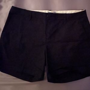 Women's black dress shorts.